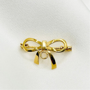 Broche Moño con Colita 14K